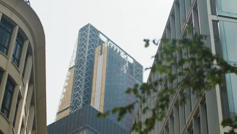 Looking-Up-At-London-Business-Skyline-Offices-With-The-Cheesegrater-Leadenhall-Building-UK-1